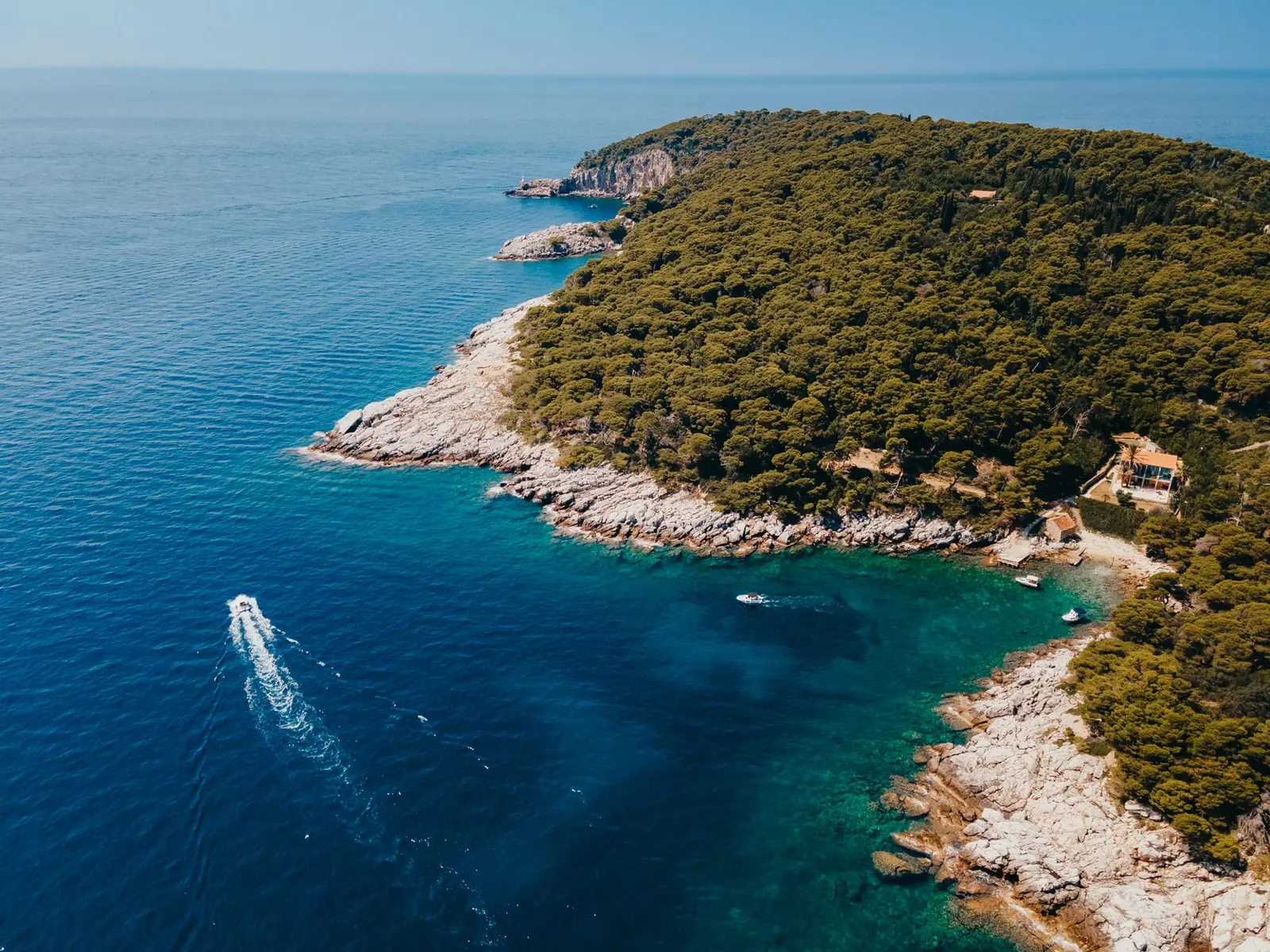 Boat in clear water near the Elaphiti Islands
